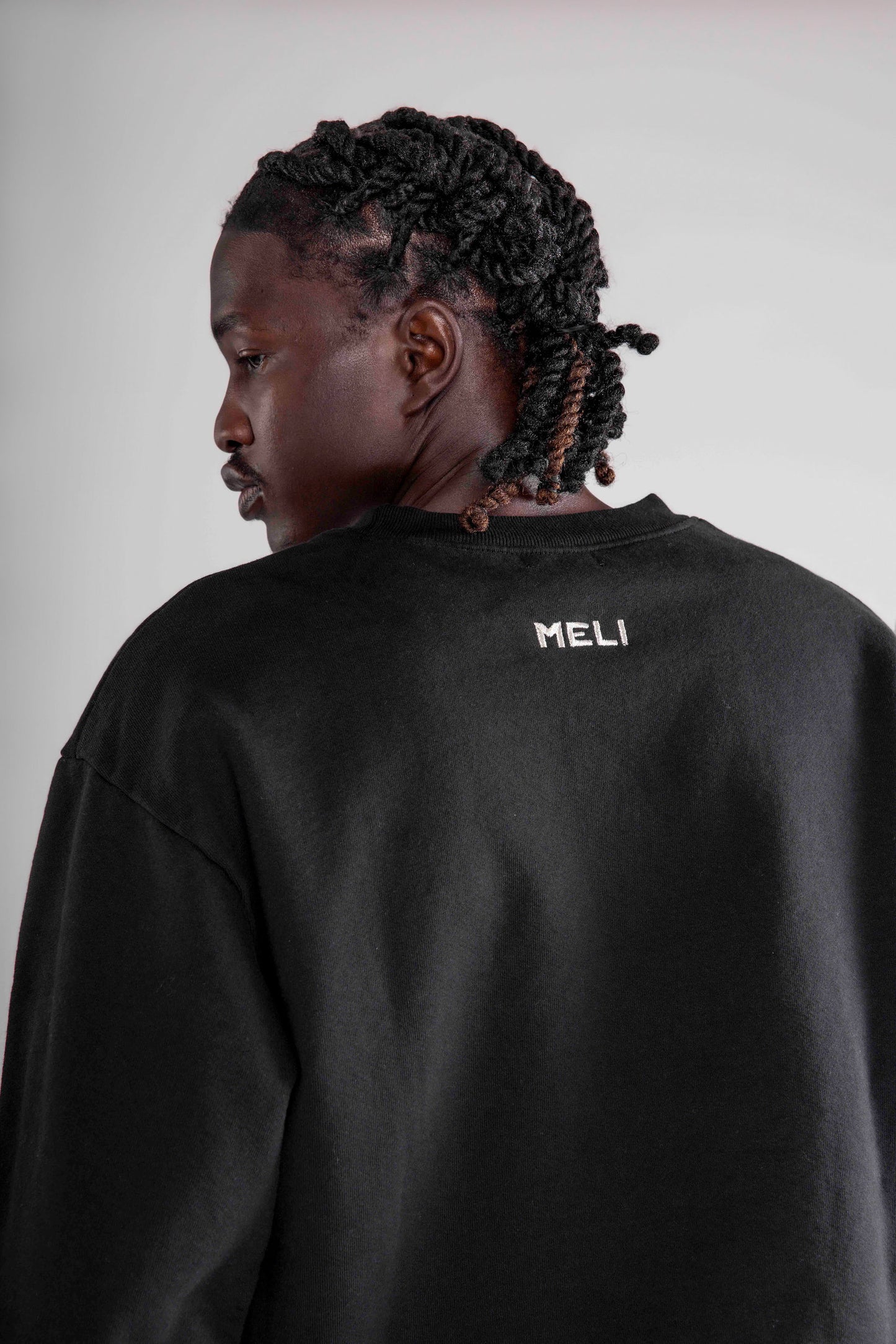 MELI TAGLINE CREWNECK