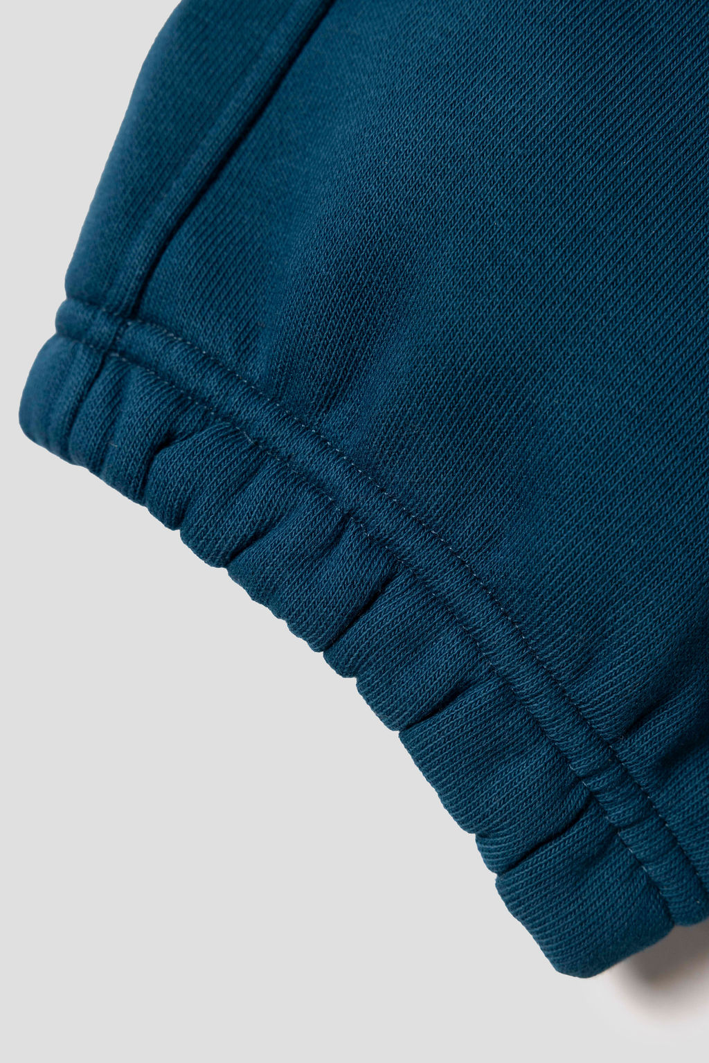 MELI Global Sweatsuit 3.0 in Atlantic, elastic ribbed ankle cuff