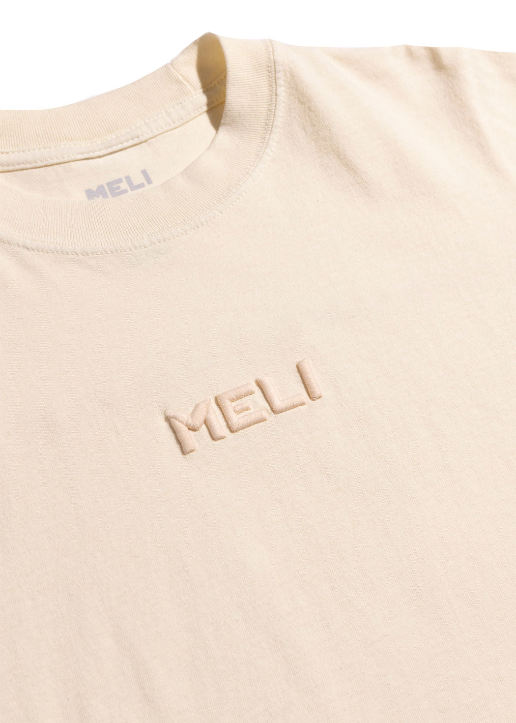 MELI WOMEN'S CROPPED STATEMENT TEE