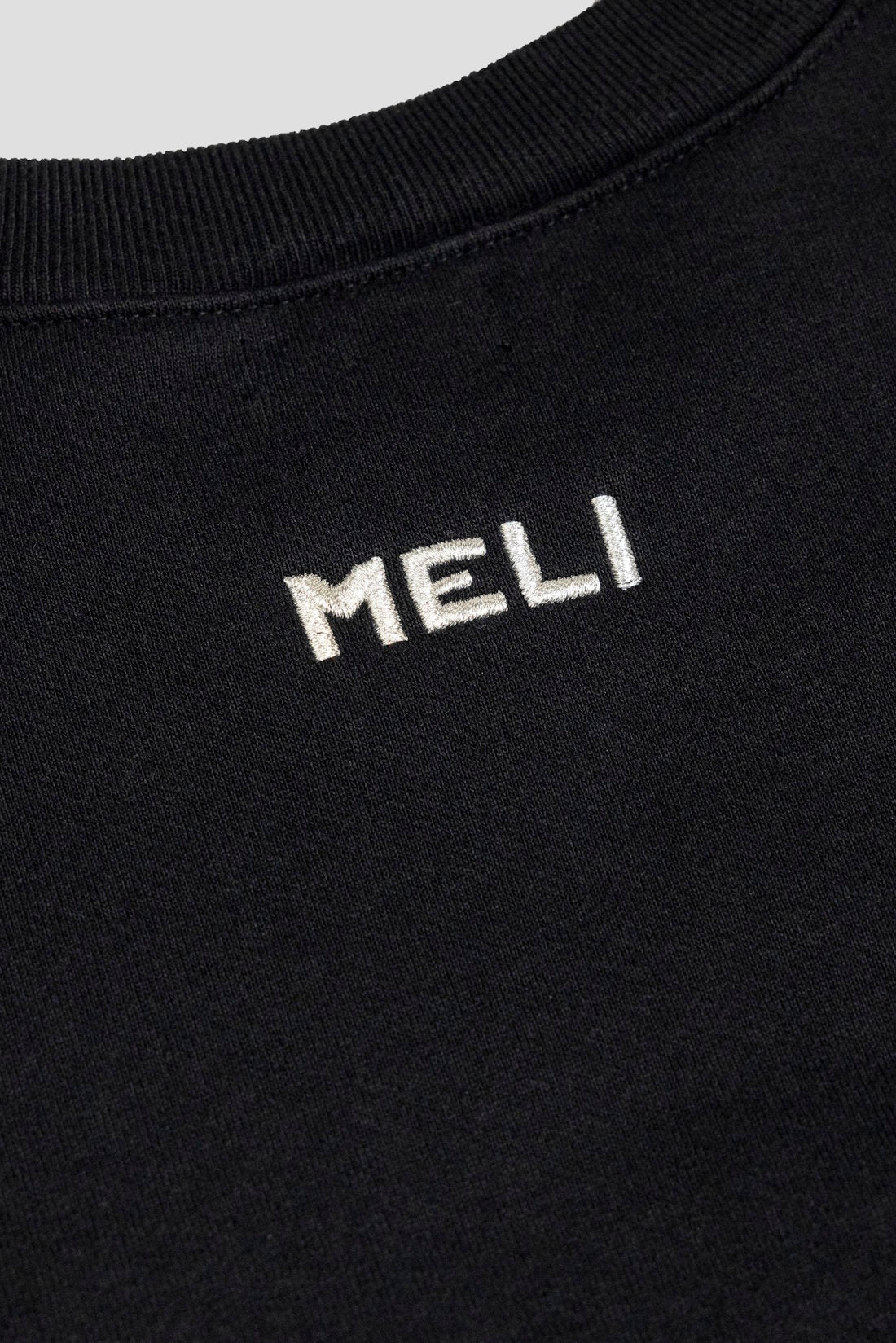 MELI TAGLINE CREWNECK