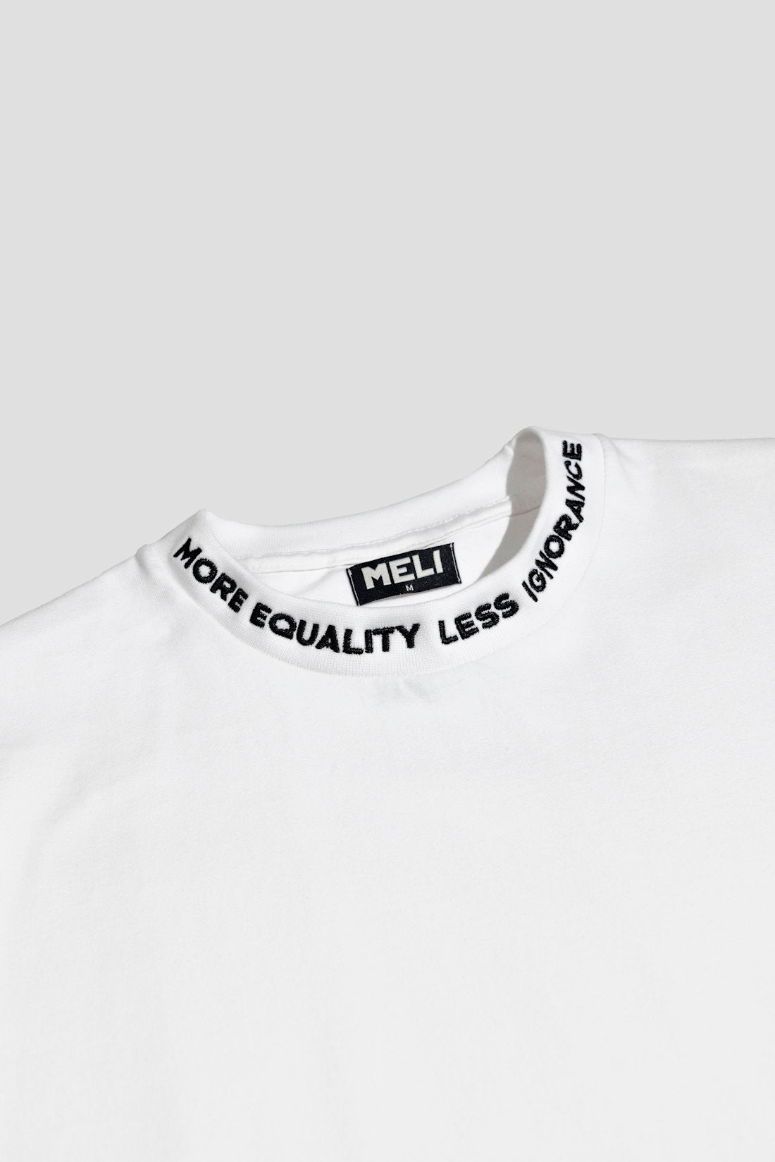 MELI TAGLINE TEE