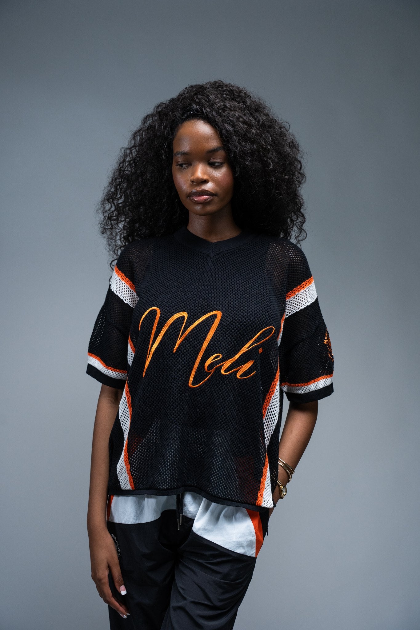 MELI MESH JERSEY — BLACK — Female model