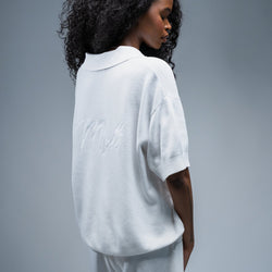 MELI V-NECK KNIT POLO — WHITE — Female model