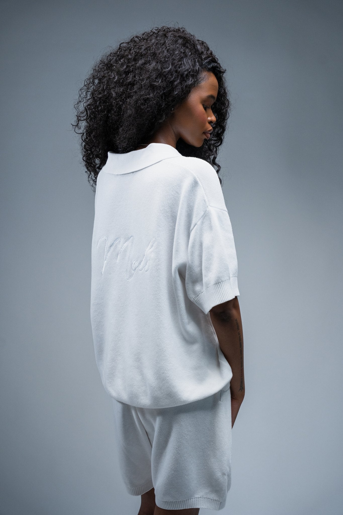 MELI V-NECK KNIT POLO — WHITE — Female model