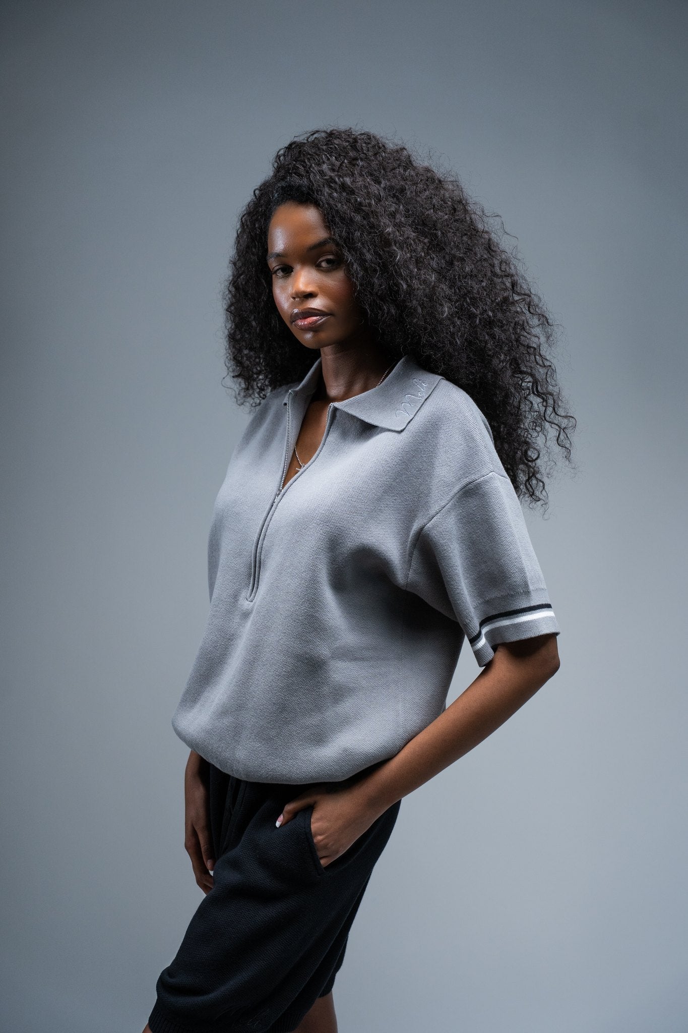MELI ZIP POLO — Charcoal Gray — Female model