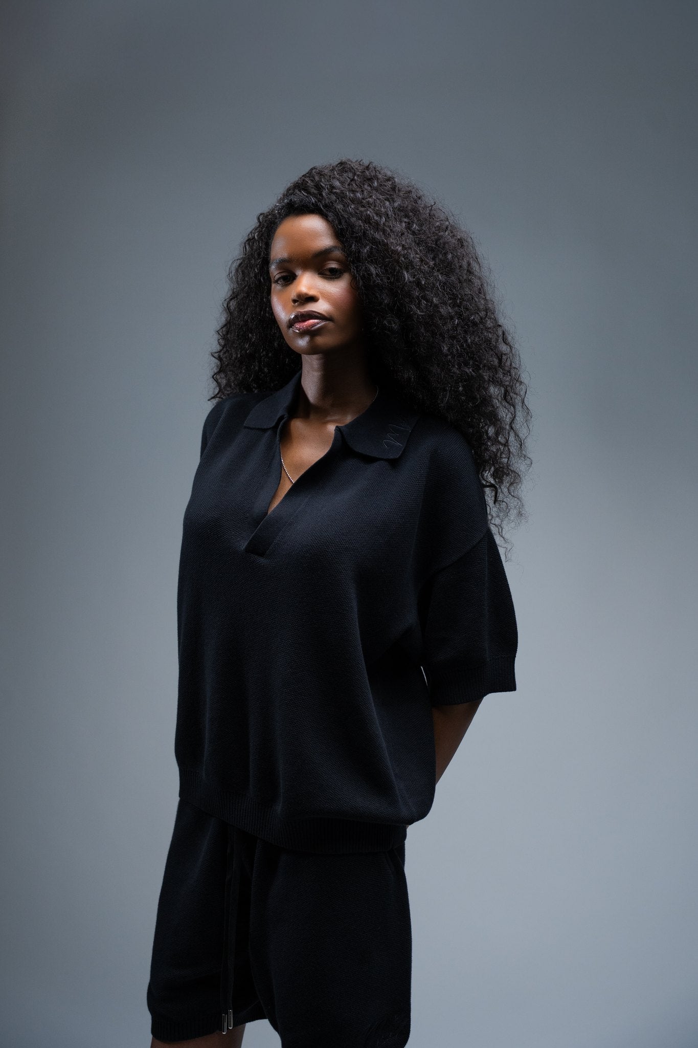 MELI KNIT SHORT — BLACK — Female model