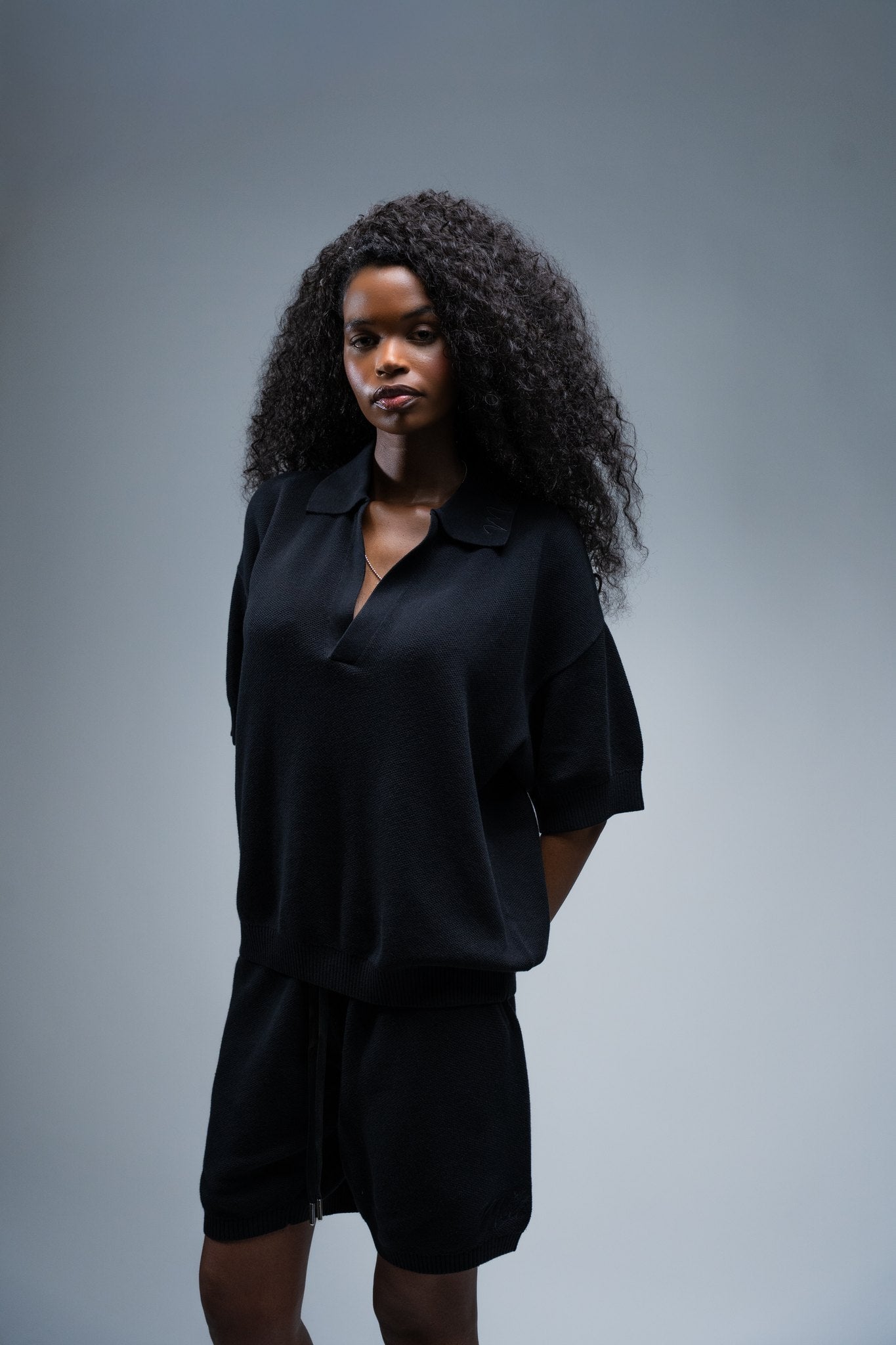 MELI KNIT SHORT — BLACK — Female model