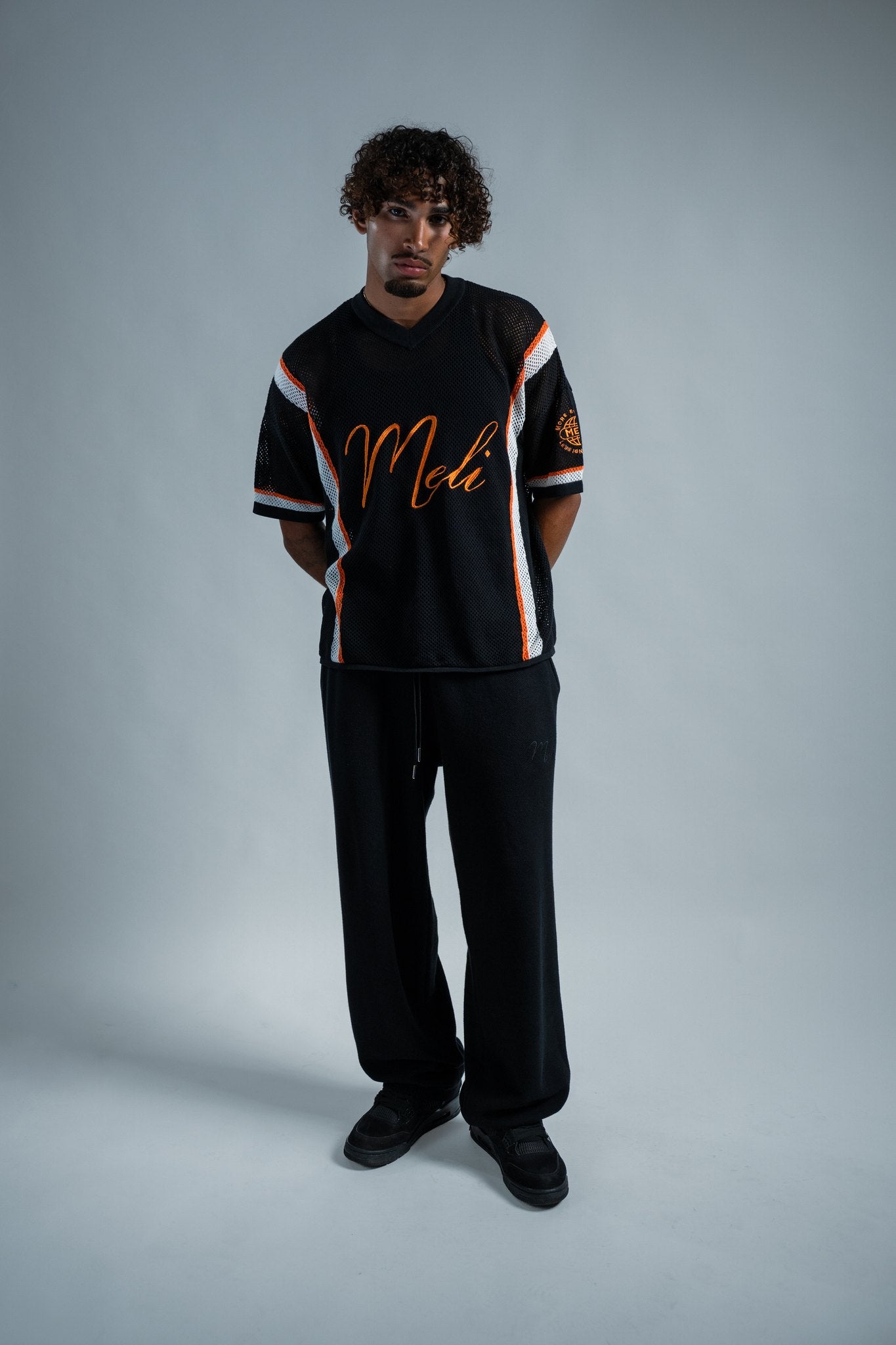 MELI MESH JERSEY — BLACK — Male model