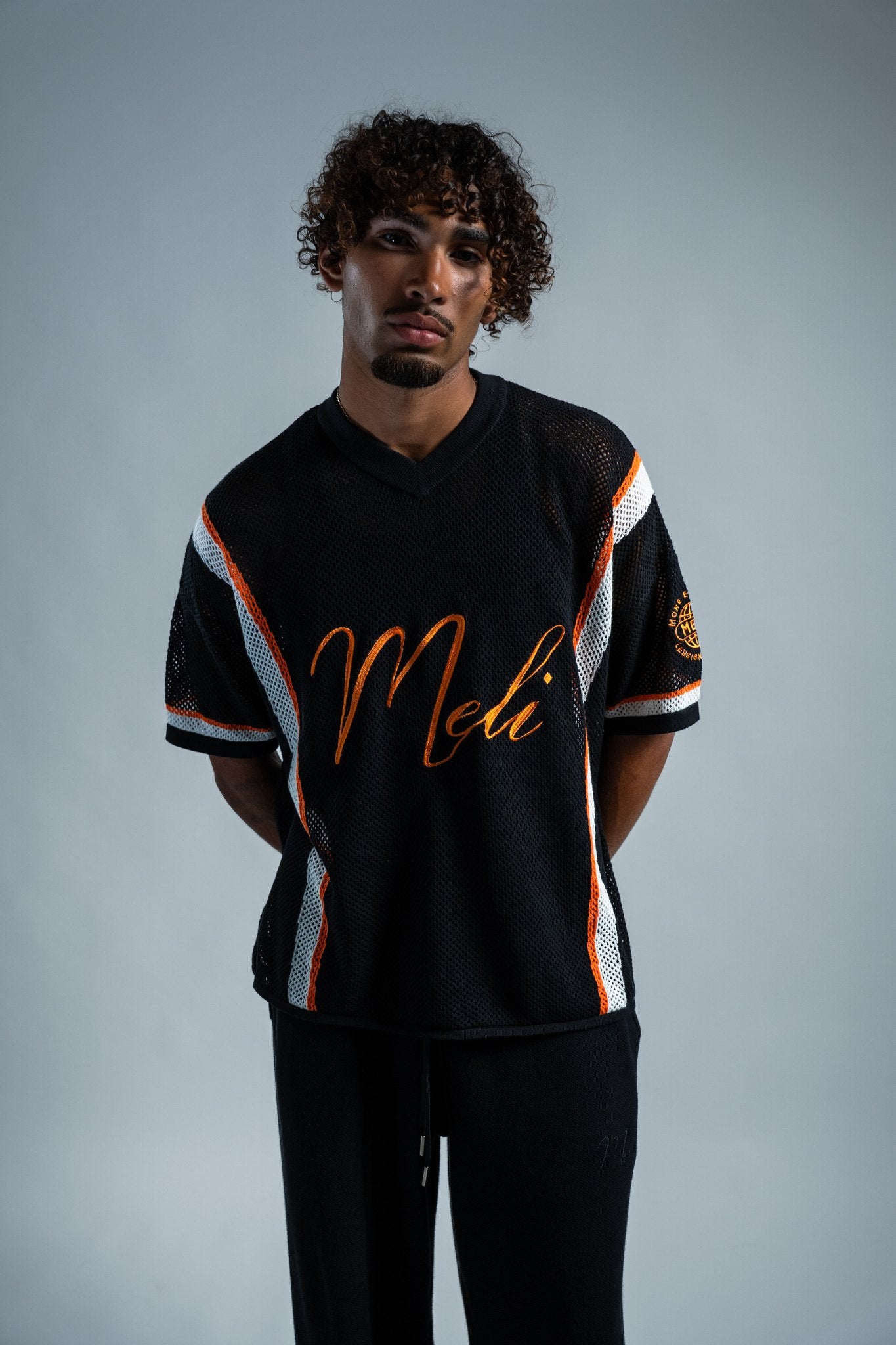MELI MESH JERSEY — BLACK — Male model
