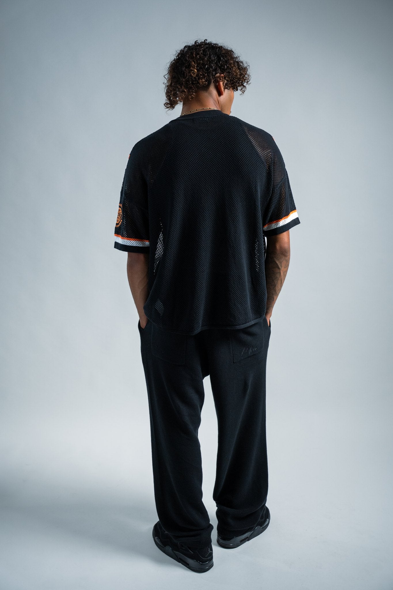 MELI MESH JERSEY — BLACK — Male model
