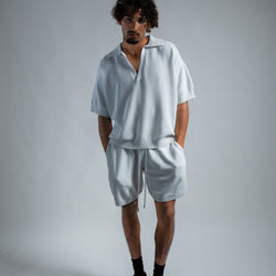 MELI V-NECK KNIT POLO — WHITE — Male model