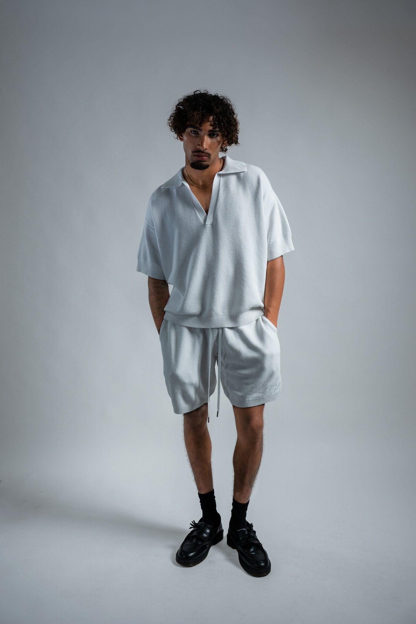 MELI V-NECK KNIT POLO — WHITE — Male model