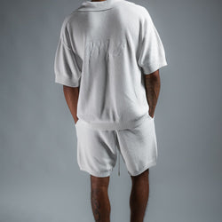 MELI V-NECK KNIT POLO — WHITE — Male model