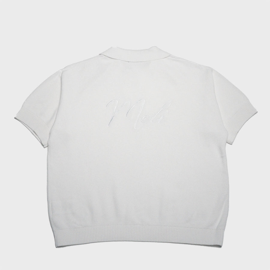 MELI V-NECK KNIT POLO — WHITE