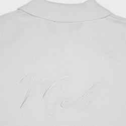 MELI V-NECK KNIT POLO — WHITE