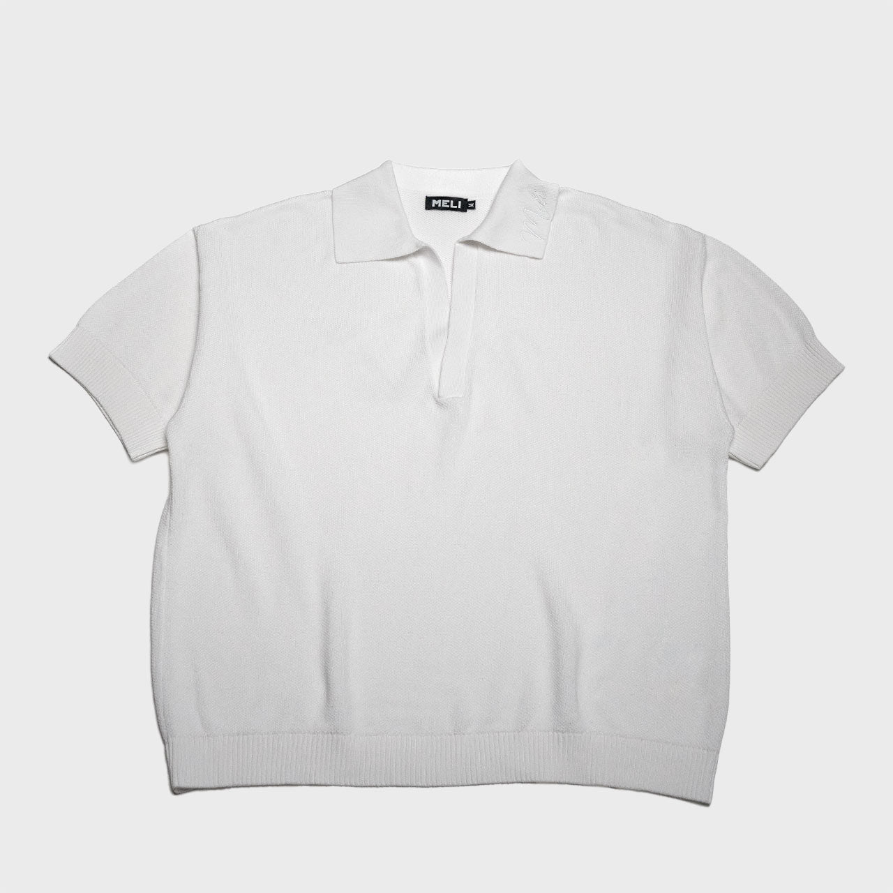 MELI V-NECK KNIT POLO — WHITE