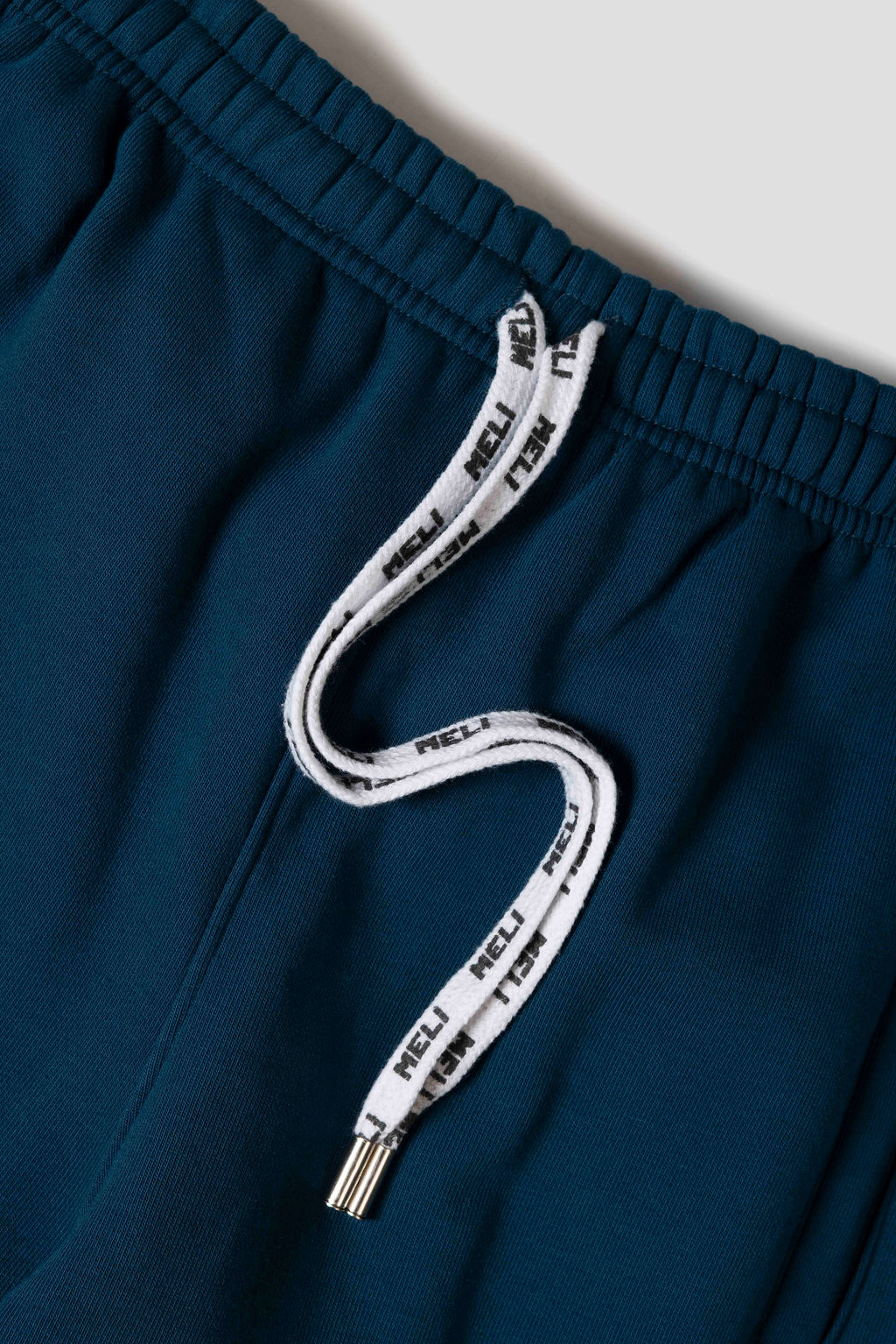 MELI Global Sweatsuit 3.0 in Atlantic, custom MELI drawstrings