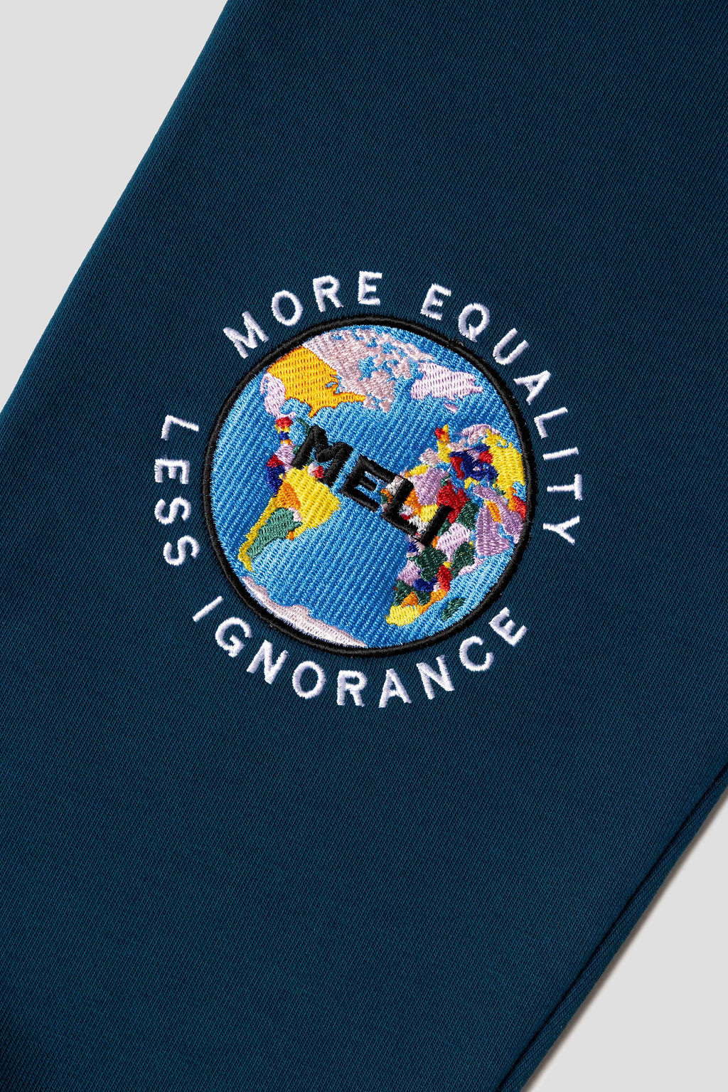 MELI Global Sweatsuit 3.0 in Atlantic, embroidered MELI Global map logo at the rear leg