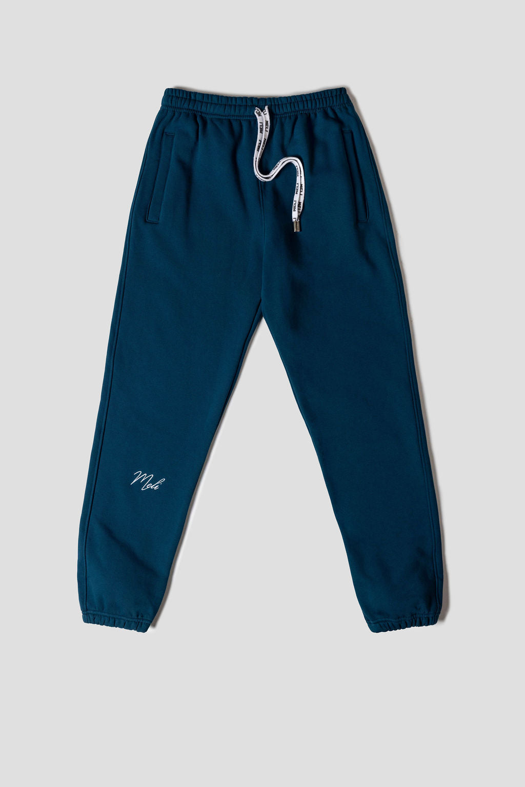 MELI Global Sweatsuit 3.0 in Atlantic, sweatpant front with MELI drawstrings and MELI script at the leg