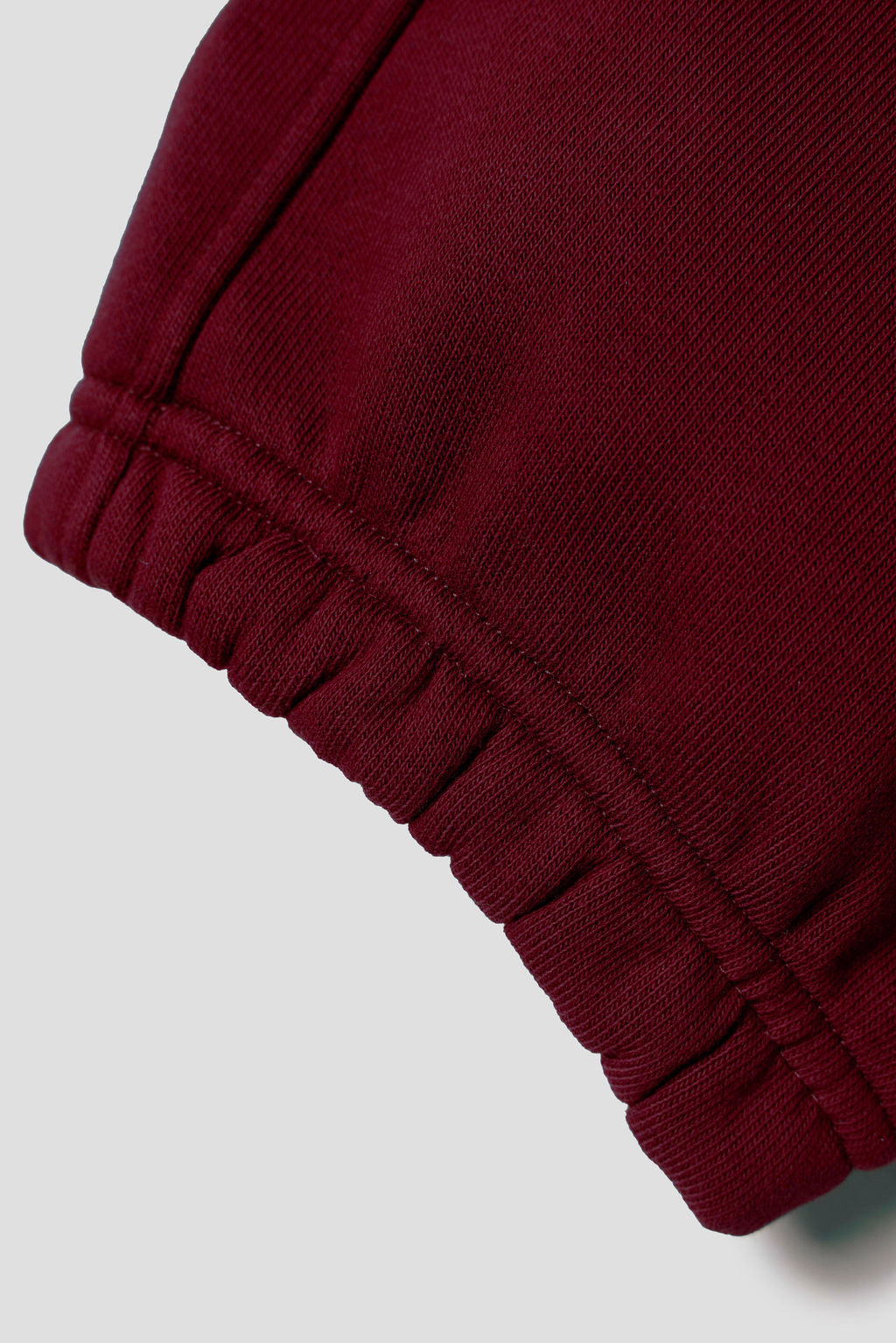 MELI Global Sweatsuit 3.0 in Crimson, elastic ribbed ankle cuff