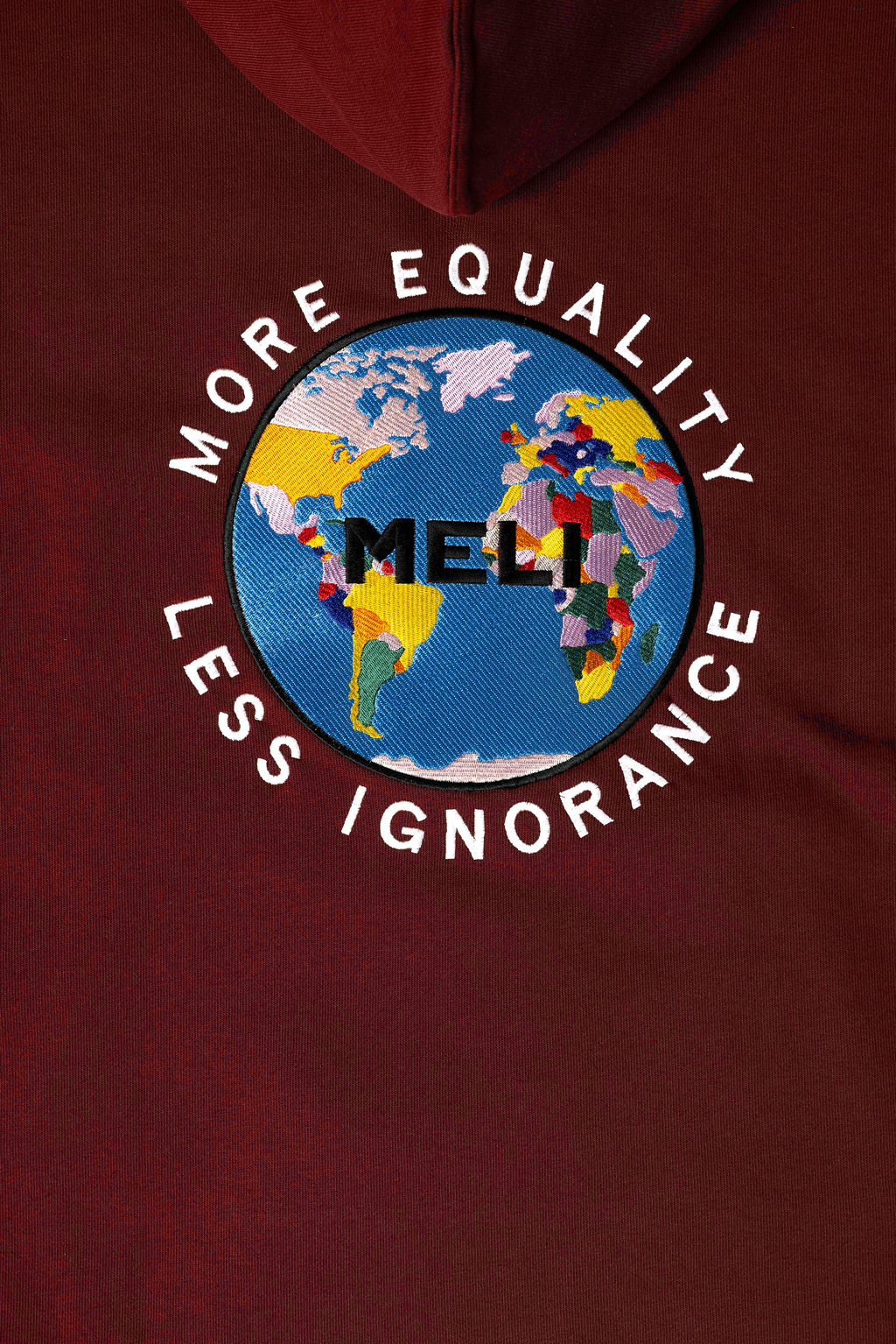 MELI Global Sweatsuit 3.0 in Crimson, fully embroidered MELI Global map logo on the hoodie back