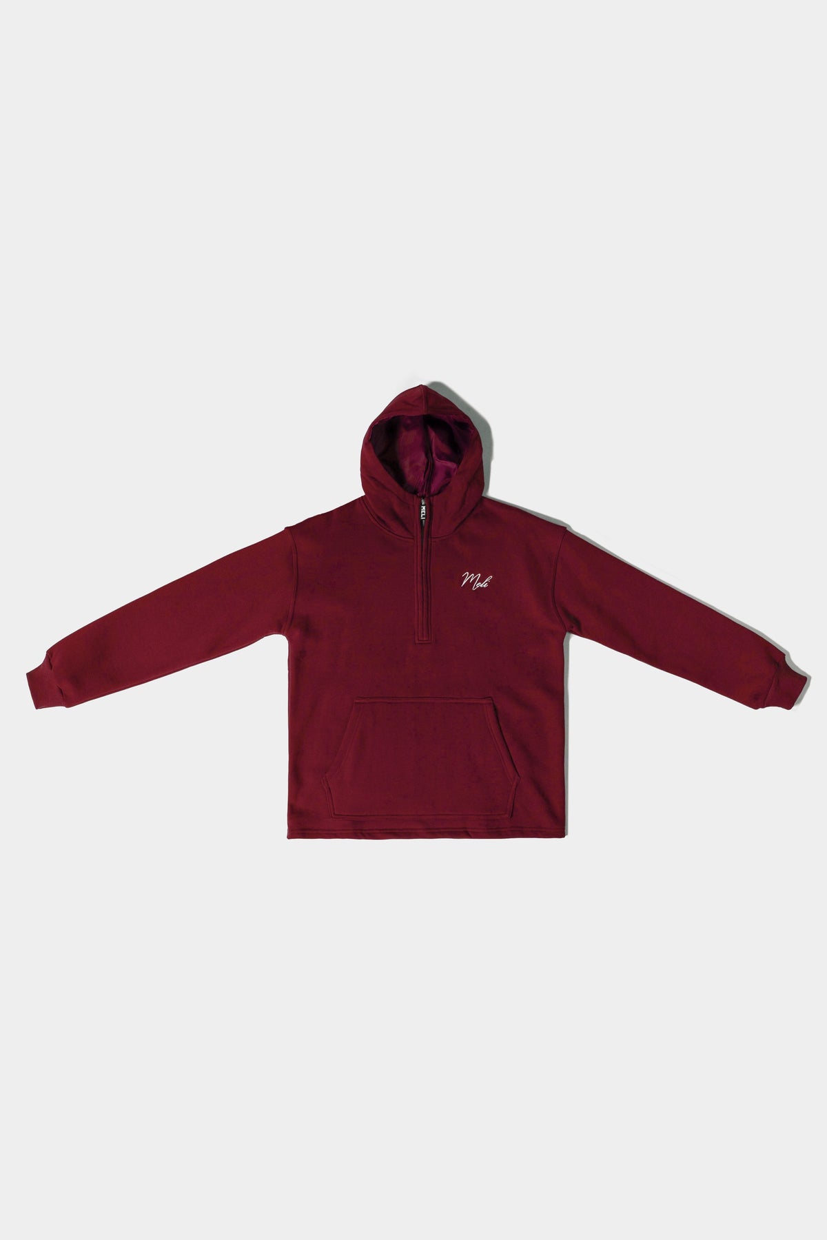 MELI Global Sweatsuit 3.0 in Crimson, hoodie front with half zip and MELI script