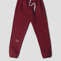 MELI Global Sweatsuit 3.0 in Crimson, sweatpant front with MELI drawstrings and MELI script at the leg