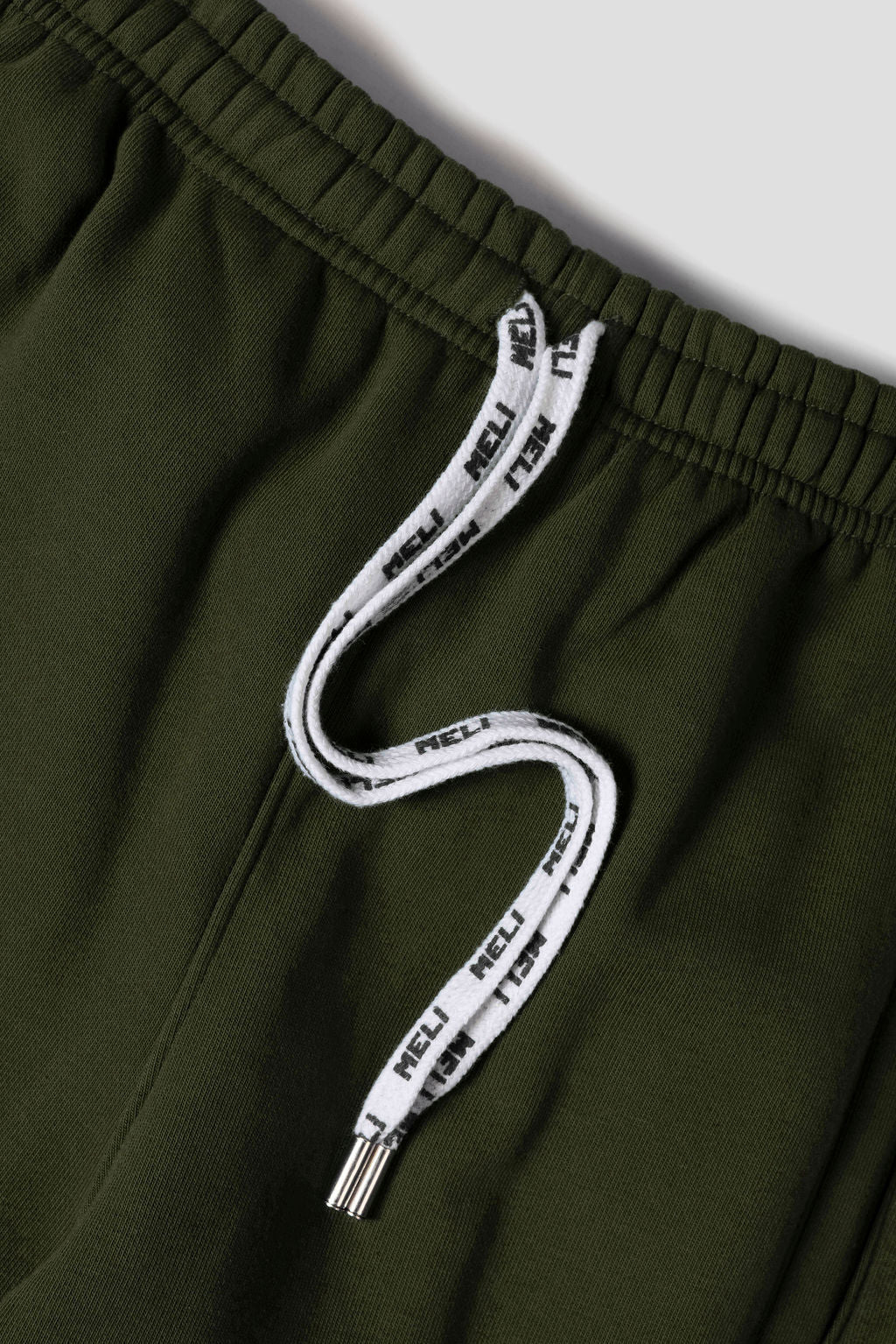 MELI Global Sweatsuit 3.0 in Olive, custom MELI drawstrings