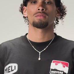 The MELI x INDYCAR trucker hat, worn