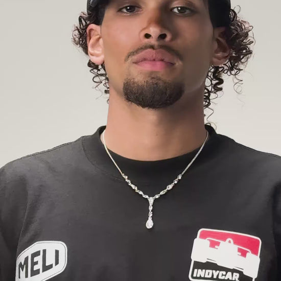 The MELI x INDYCAR trucker hat, worn