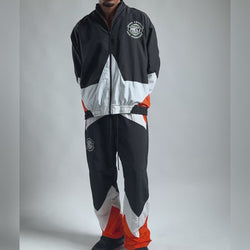 The MELI Starbreaker pant worn with the matching jacket, moving